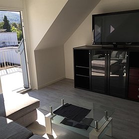 Wohnzimmer mit Balkon südlich Obergeschoß